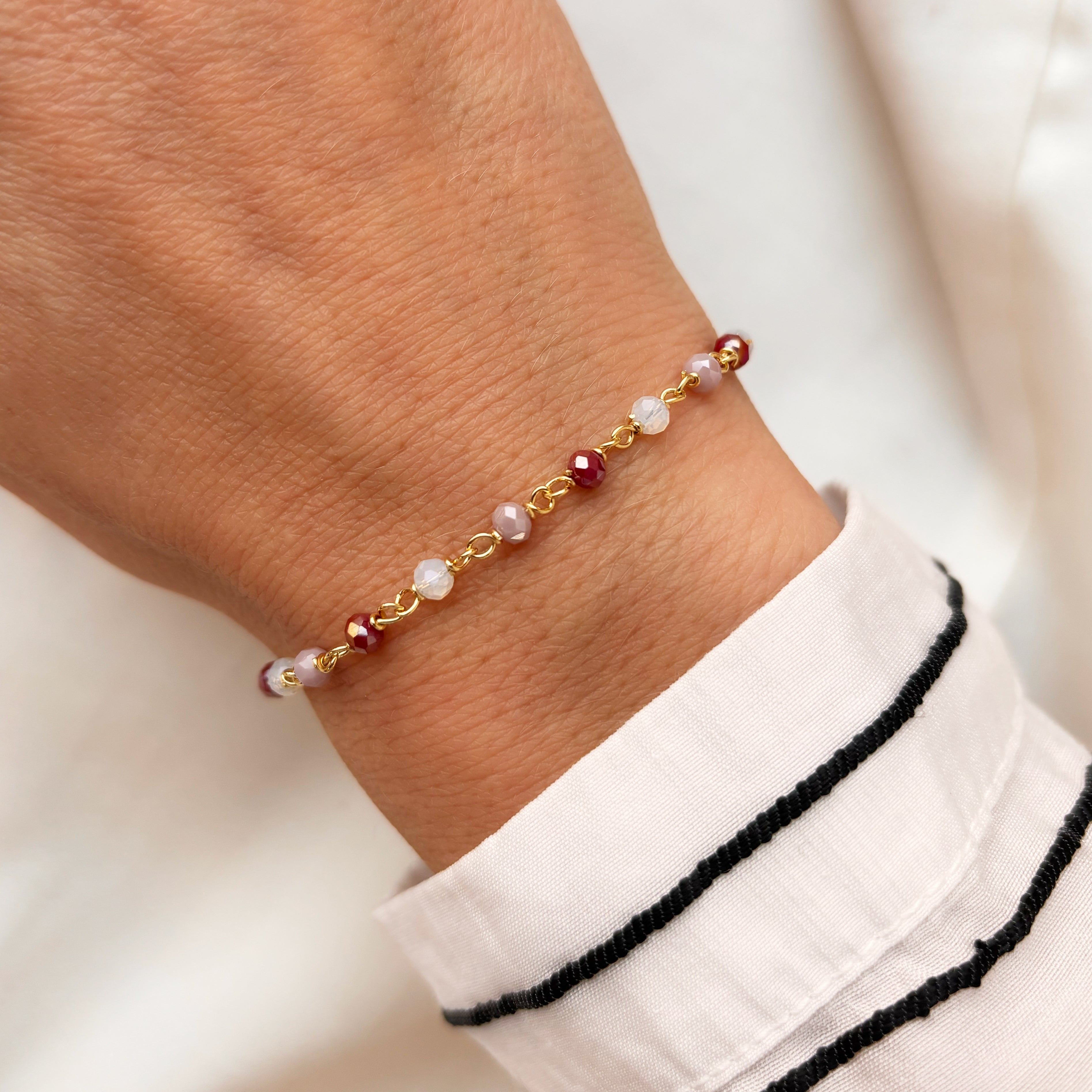 Sølv forgyldt armbånd med rosa krystaller