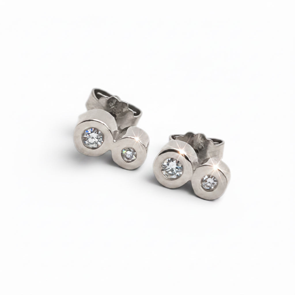 14 kt. hvigulds ørestikker m/4x0,04 ct.
