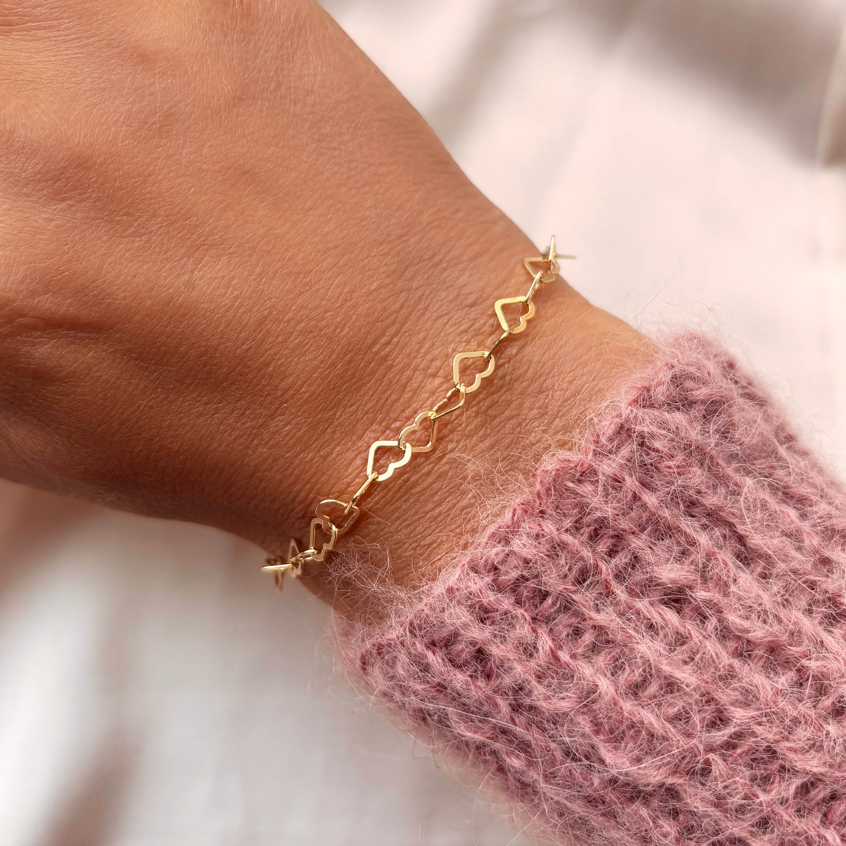 Armbånd forgyldt hjerter 17+2cm.