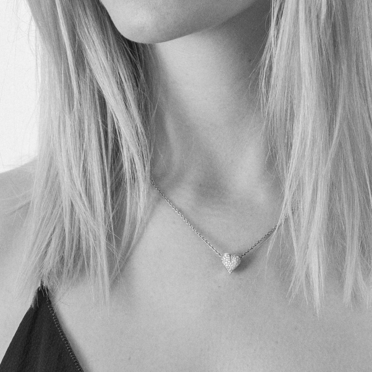 Hjerte lås vedhæng 18 kt. guld m/i alt 0,30 ct.