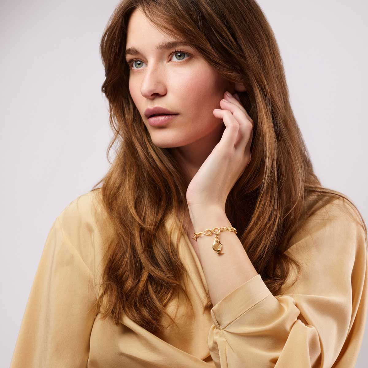 Bird Family charm m/rutilkvarts 18 kt. guld