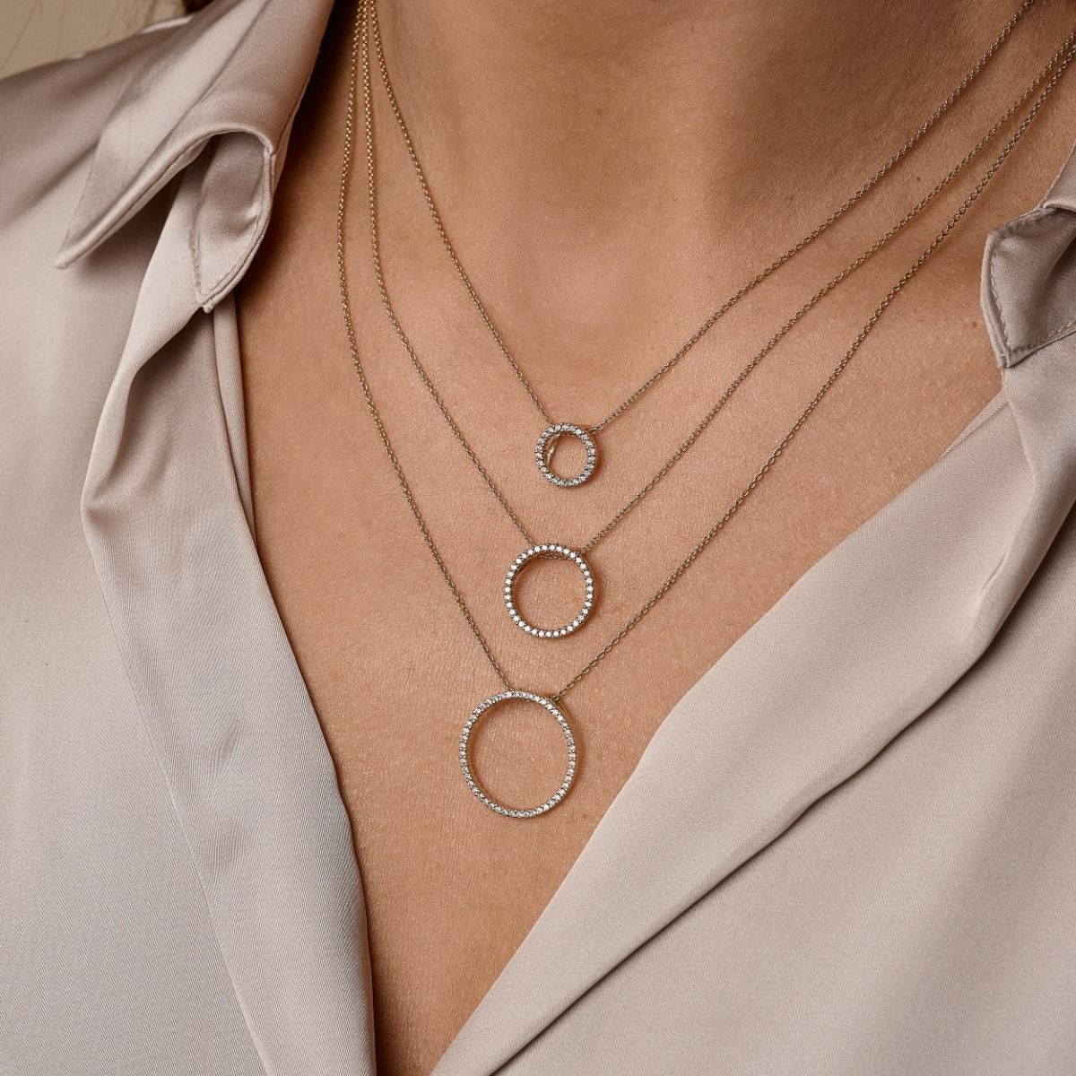 14 kt. cirkelvedhæng m/0,29 ct. W-si