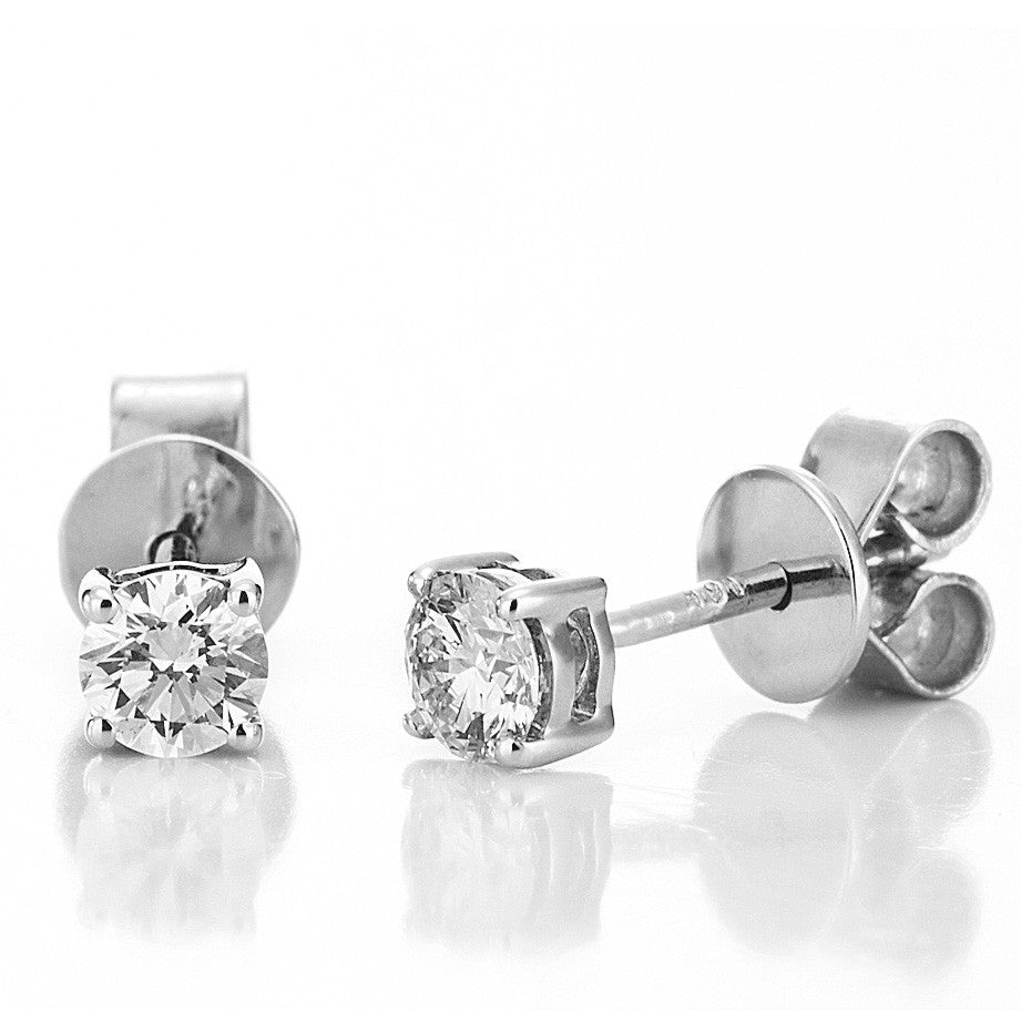 18 kt. hvg.ørestikker 0,30ct.TW-si