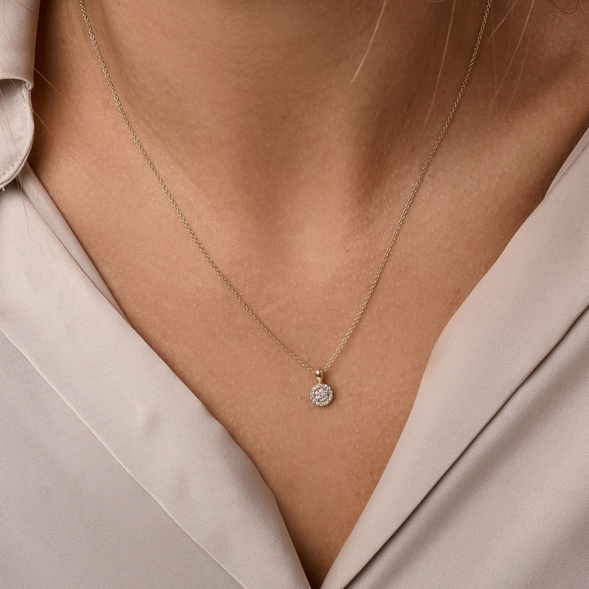 14 kt. Sia vedhæng m/0,17 ct. W-si
